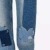 Pantalones de denim con patchwork Pantalones de denim con patchwork