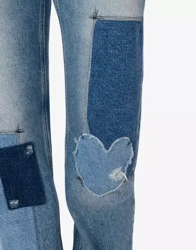Pantalones de denim con patchwork Pantalones de denim con patchwork