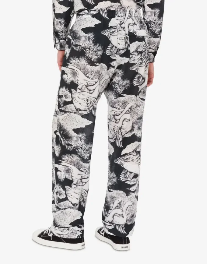 Pantalones ligeros de popelín de algodón con estampado de gansos Pantalones ligeros de popelín de algodón con estampado de gansos